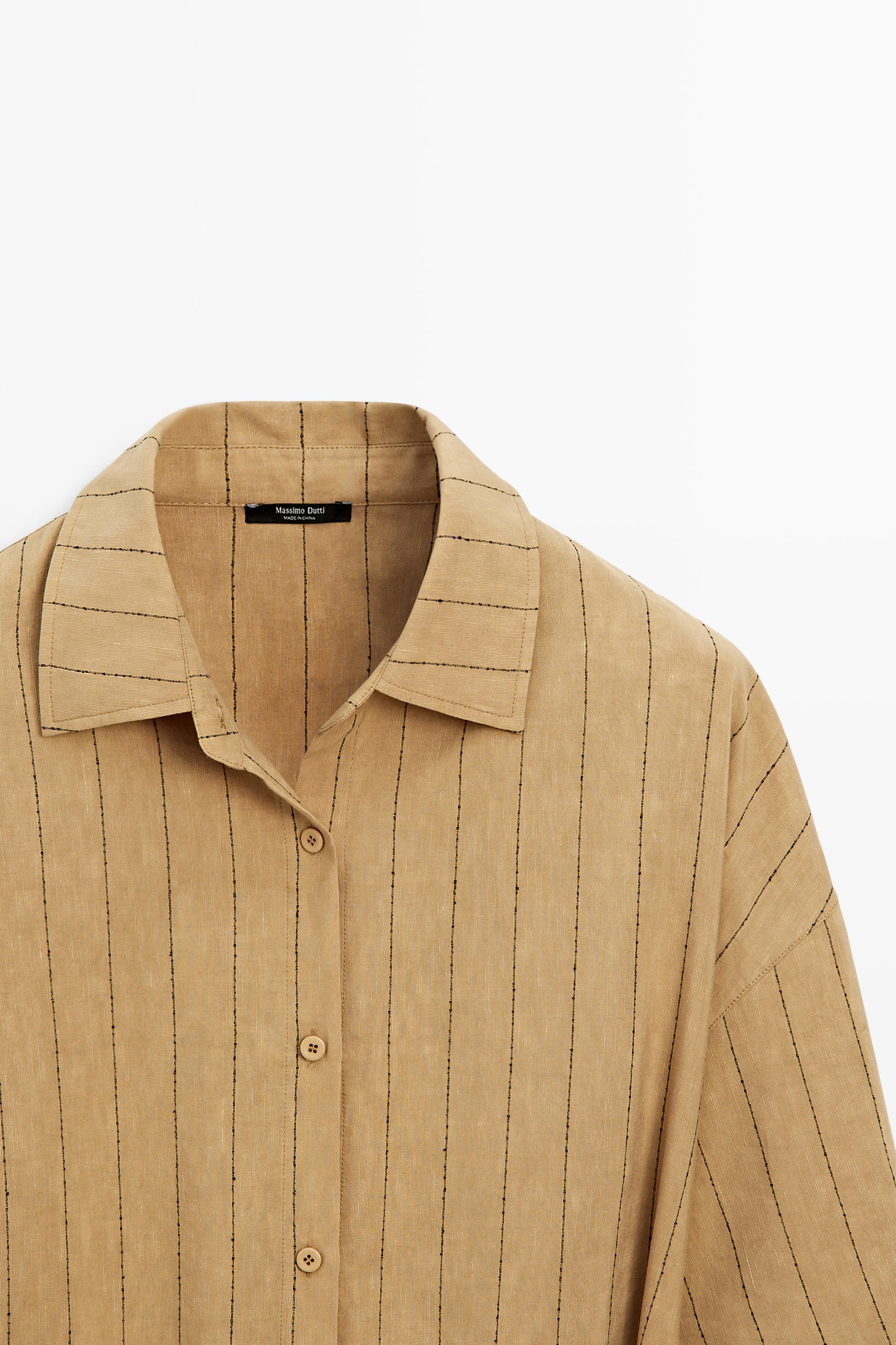 Striped flowing shirt with corset belt detail